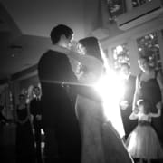 Bride and groom dancing at an elegant Fairfield wedding reception with DJ lighting